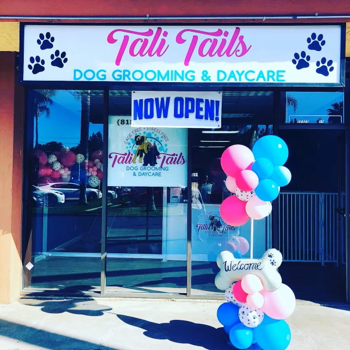 Tali Tails Dog Grooming and Daycare from outside, with welcome balloons